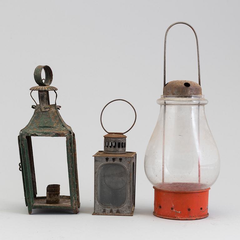 THREE GLASS AND TIN LANTERNS, 19th century.