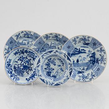 A set of three blue and white plates, a bowl and a dessert dish, Qing dynasty, 18th century.