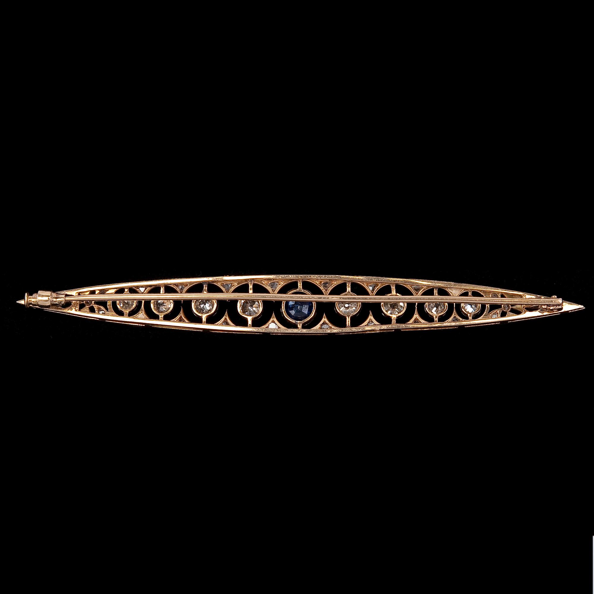 A BROOCH, old cut diamonds c. 1.10 ct, blue sapphire.