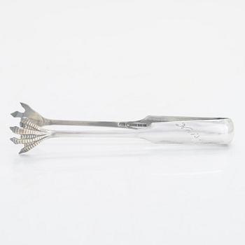 Silver sugar tongs, Herman Wist, Uusikirkko, Carelia 1928, a 3-piece coffee service, a candlestick pair, Finland 1950s.