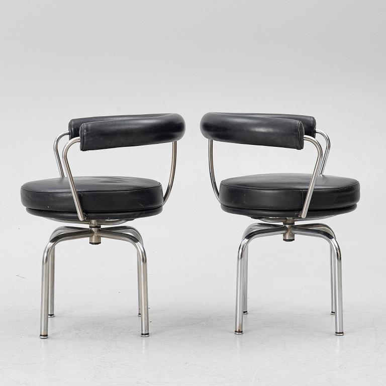 Charlotte Perriand, /Le Corbusier, swivel armchairs, a pair, model LC7, Cassina, Italy, later part of the 20th century.