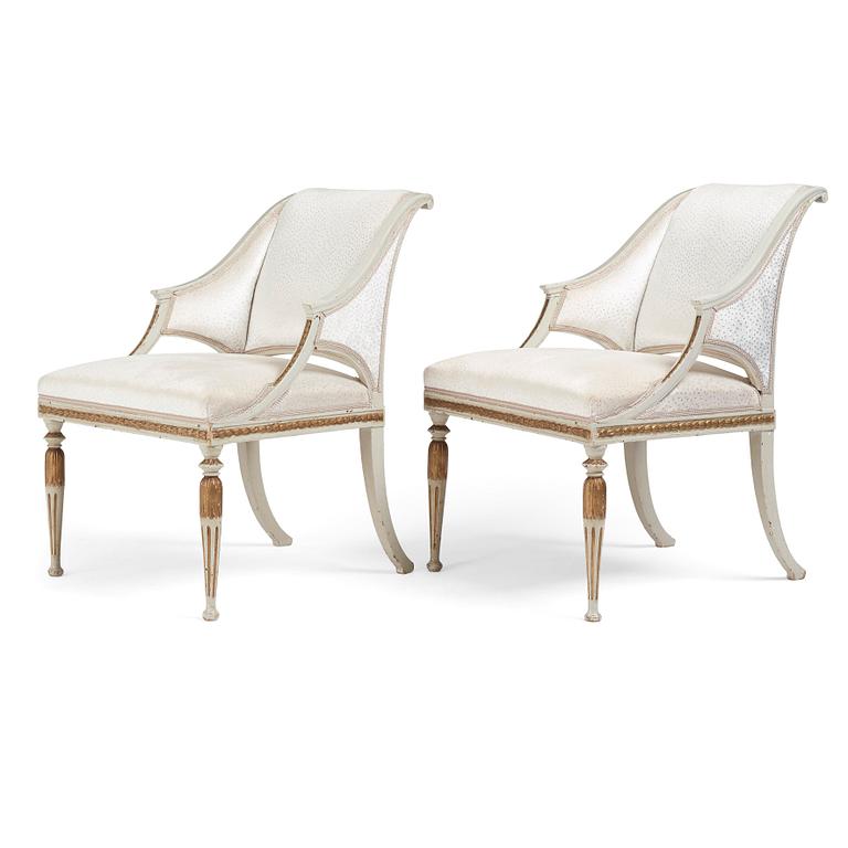 A pair of late Gustavian armchairs by E Ståhl (master in Stockholm 1794-1820).