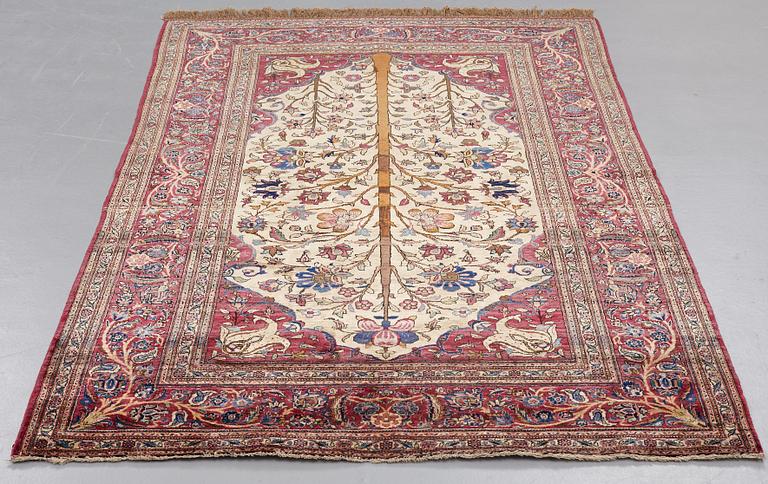 MATTO, a semi-antique silk Kashan,  ca 205 x 131,5 cm.