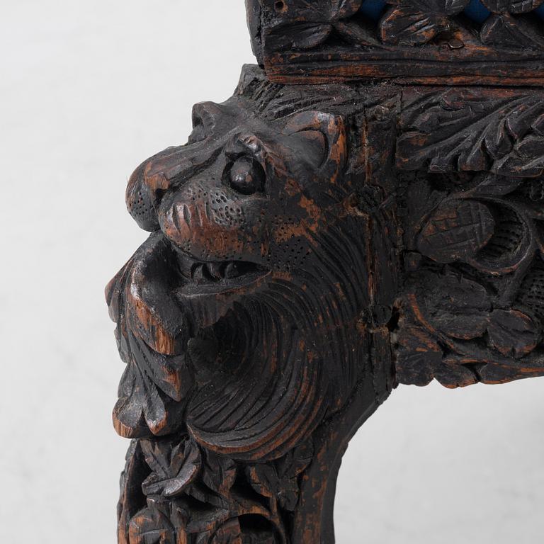 A carved 'blackwood' armchair.  bombay presidency circa 1880.