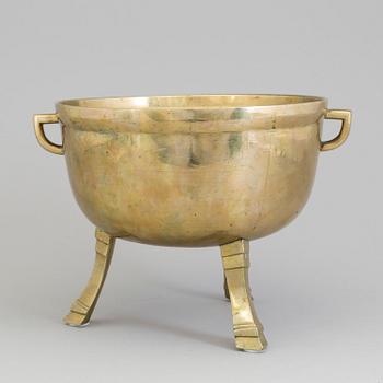 A 19th century brass stew.