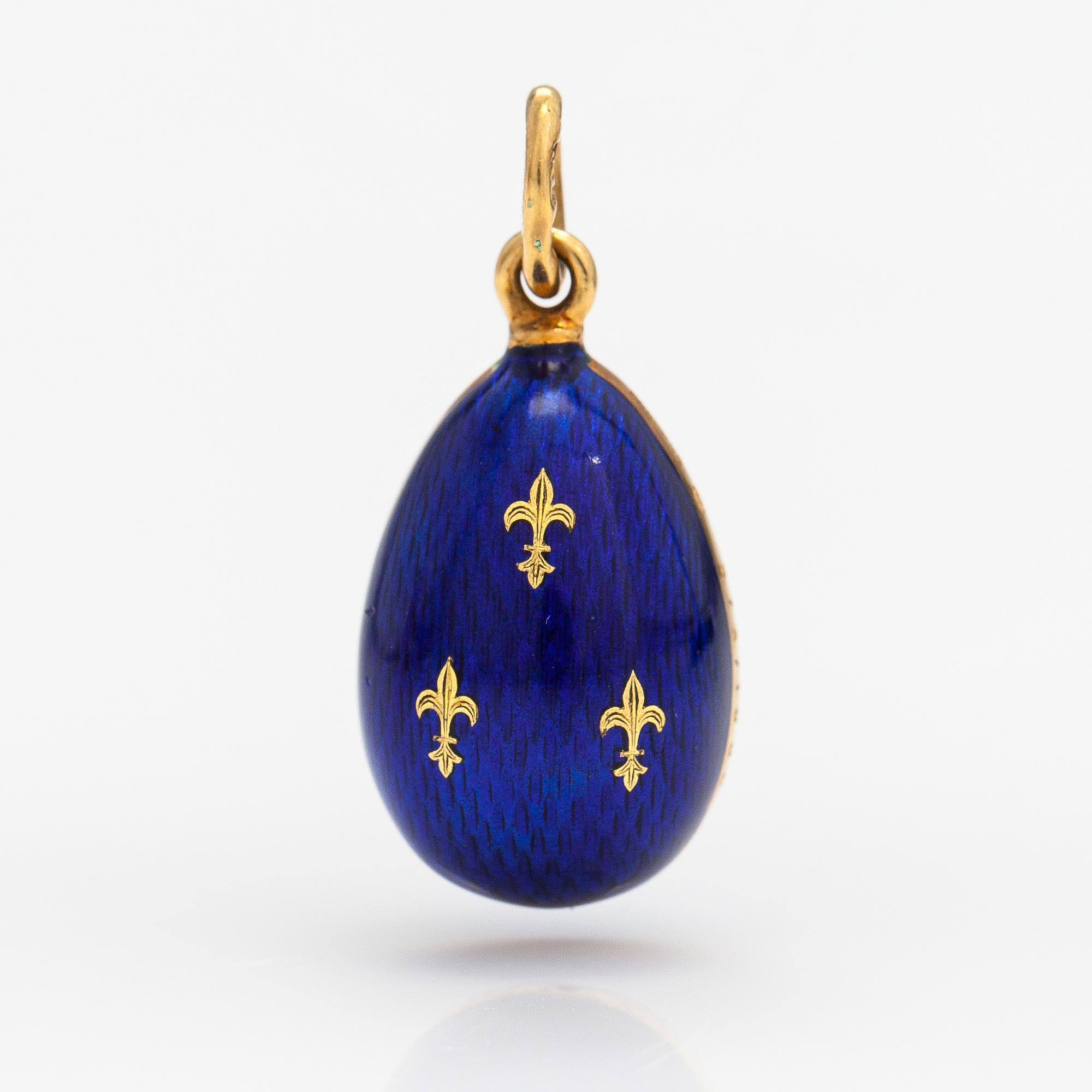 Fabergé, An 18K gold and enamel egg shaped pendant. Marked Fabergé, 573/1000. Victor Mayer.