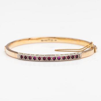 ARMBAND, 14K guld, syntetiska rubiner. Tarkkanen Oy, Helsingfors 1959.