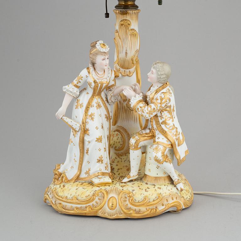 a rococo-style porcelain table lamp from the first half of the 20th century.