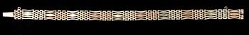 ARMBAND, 14K (56) två färgers guld, Moskva 1907-17.