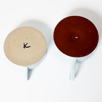 Kennet Williamsson, a set of eight ceramic pieces, signed.