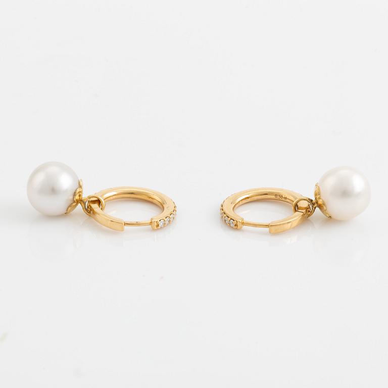 South sea pearl and brilliant cut diamond earrings.