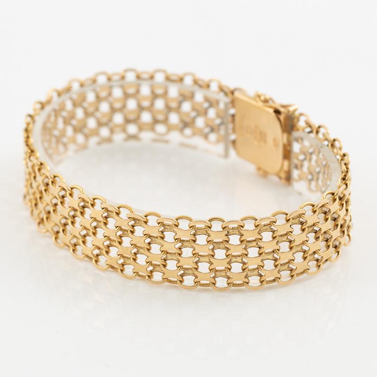 Arm bracelet, 18K gold, x-link.