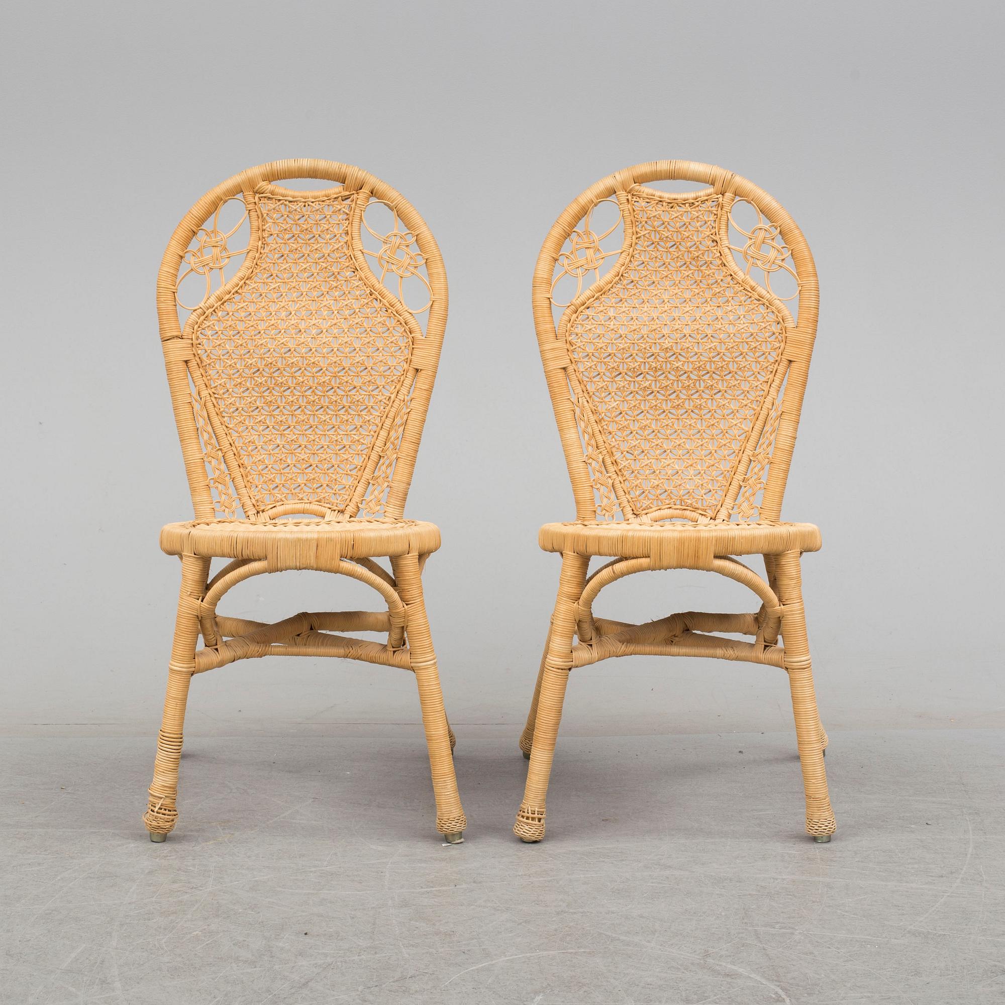 A pair of second half of the 20th cnetury rattan chairs.