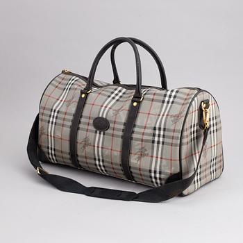 Burberry, a canvas weekend bag.