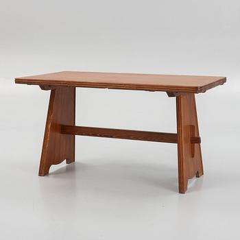 Göran Malmvall, a pine dining table and three chairs, mid 20th century.