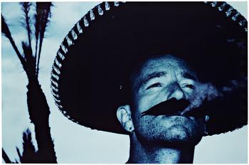 275. Anton Corbijn, "Bono (hat) Cabo San Luca", 1997.