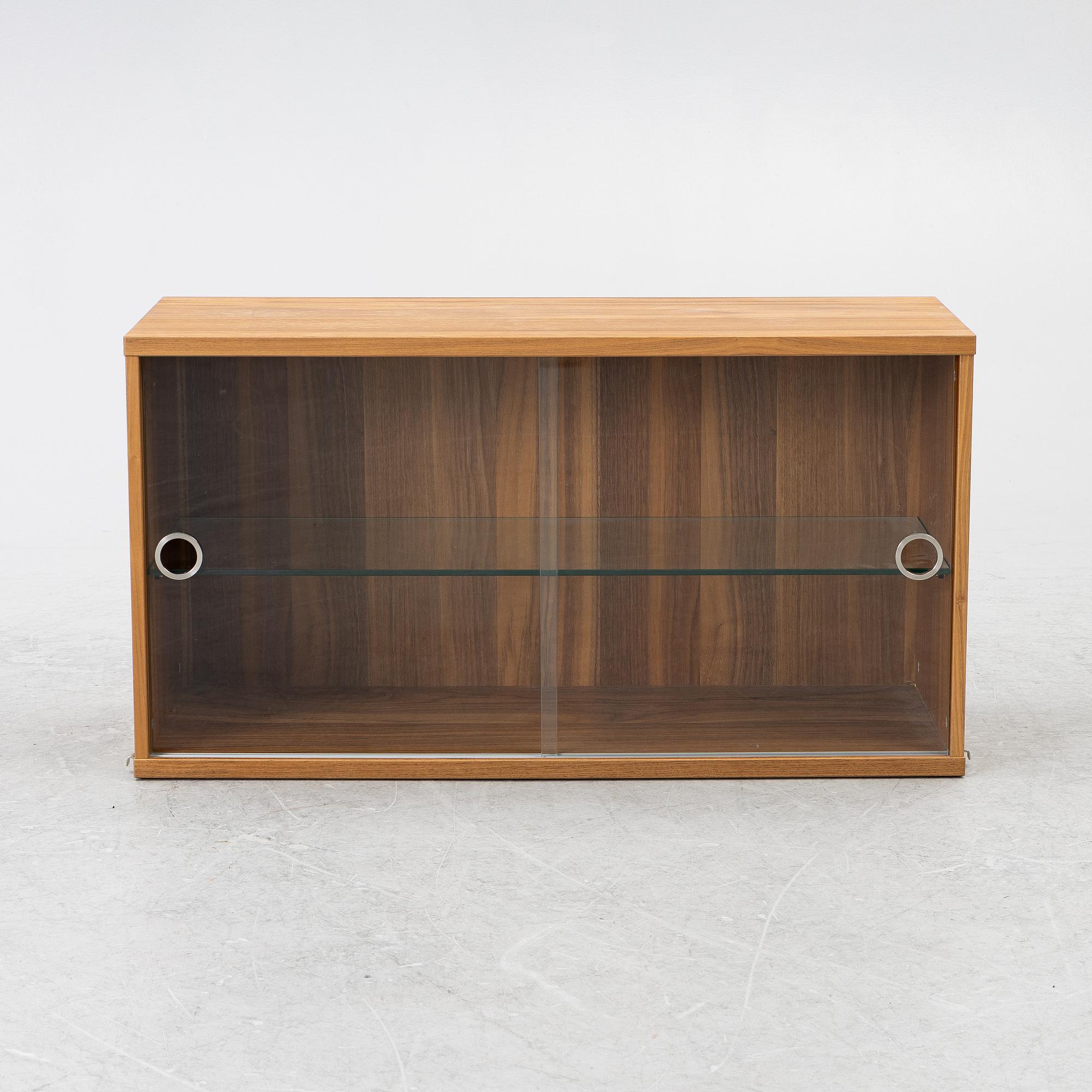 Nils Strinning, a "String" book case with cabinet, Sweden, 21st century.