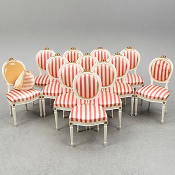 A set of 12 Swedish chairs, gustavian style, for NK (Nordiska Kompaniet), mid 20th century.