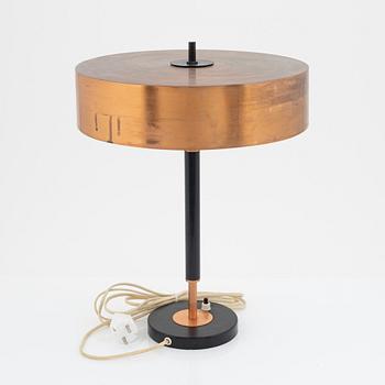 A copper table light, mid 20th Century.