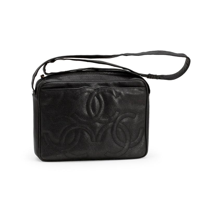 CHANEL, a black caviar leather shoulder bag.