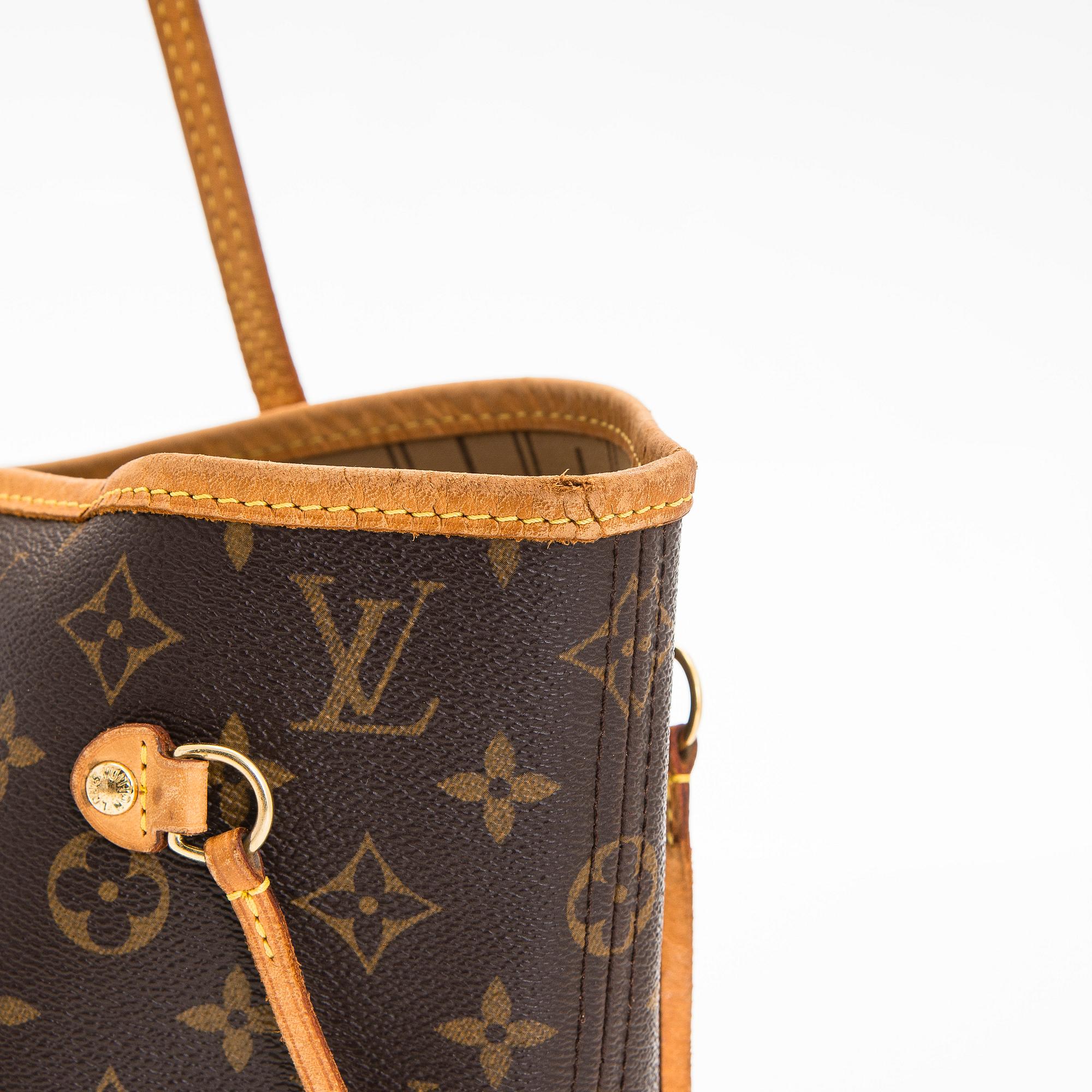 Louis Vuitton, a Monogram Canvas 'Neverfull MM' bag.