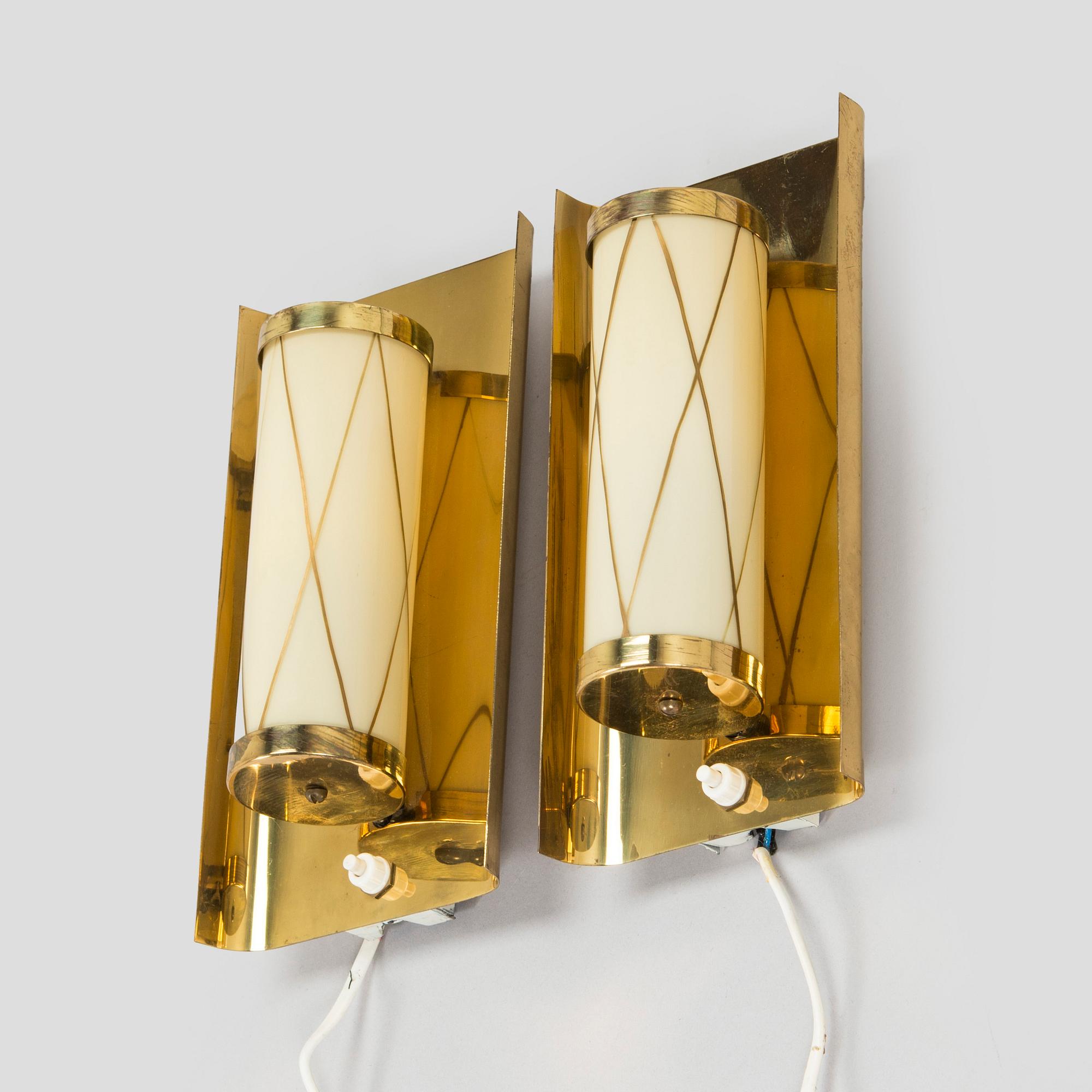 A pair of mid 20th century wall lights for Aris, Arisuo, Finland.