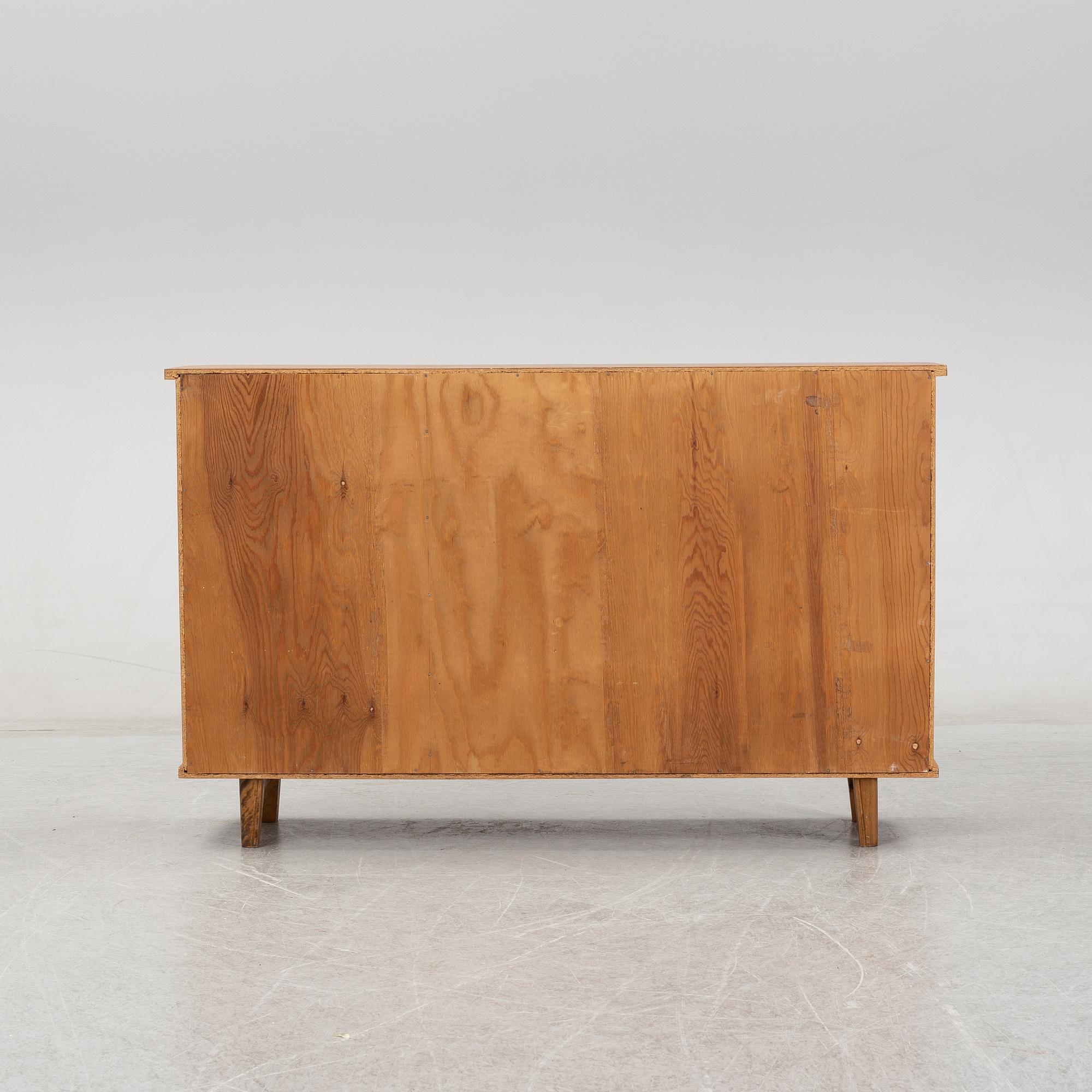 A teak book case. Second half of the 20th Century.