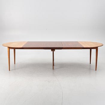 Niels Otto Møller, a rosewood dining table and eight rosewood chairs, Poul Jeppesen & JL Möller, Denmark, 1960's.