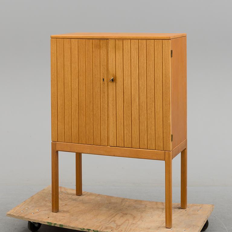 An oak drinks cabinet, 1960's.