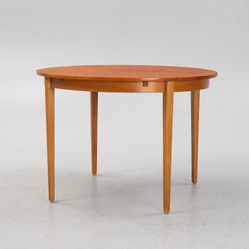 A dining table, 1950s/60s.
