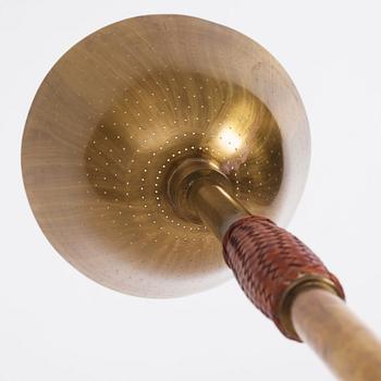 Carl-Axel Acking, a brass and leather floor lamp, designed for the Stockholm Association of Crafts in 1939.