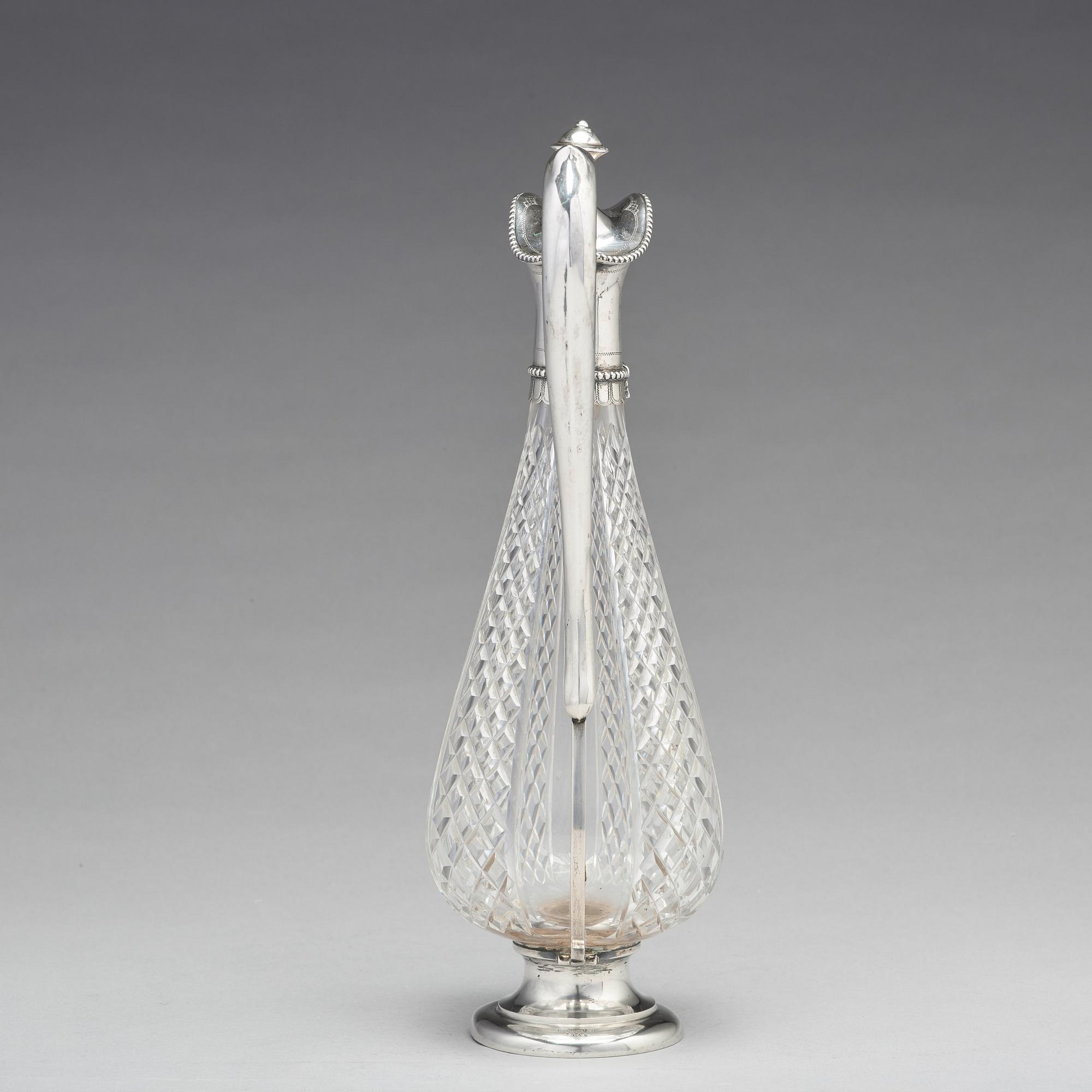 A Swedish 19th century parcel-gilt silver and glass wine-jug, mark of Lars Larsson & Co, Stockholm 1872.