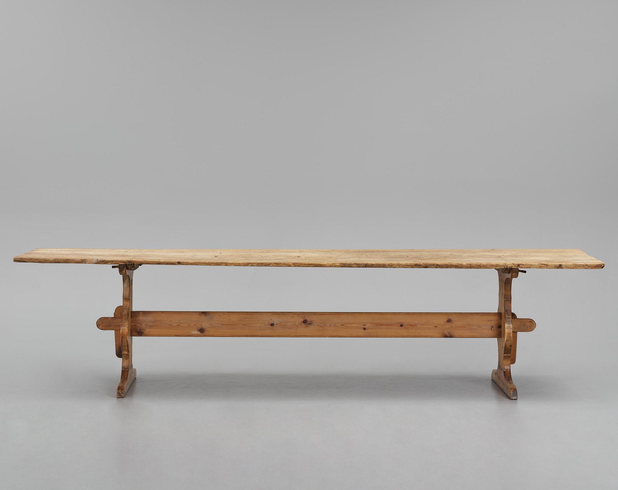 A pine trestle table, 20th century incorporating older elements.