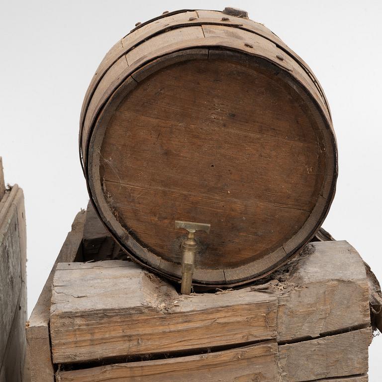 A pair of oak wine casks on stands, early 20th century.