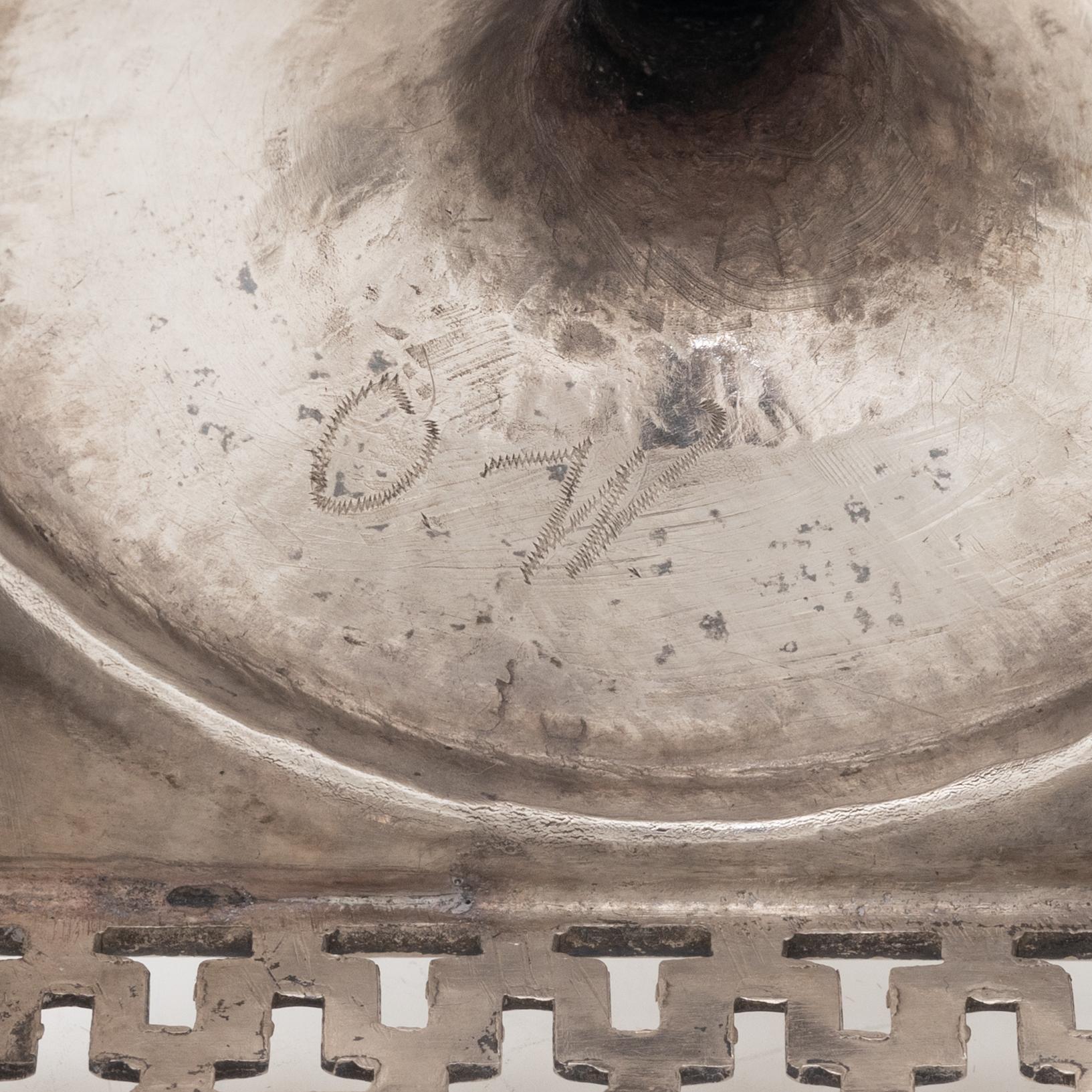 A silver sugarbowl with lid and a creamer, marks of Olof Hellbom, Stockholm, Sweden 1799-1800.