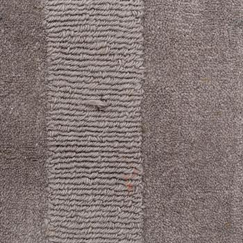 A Layered "Wool Cubes" carpet, 390x620 cm.