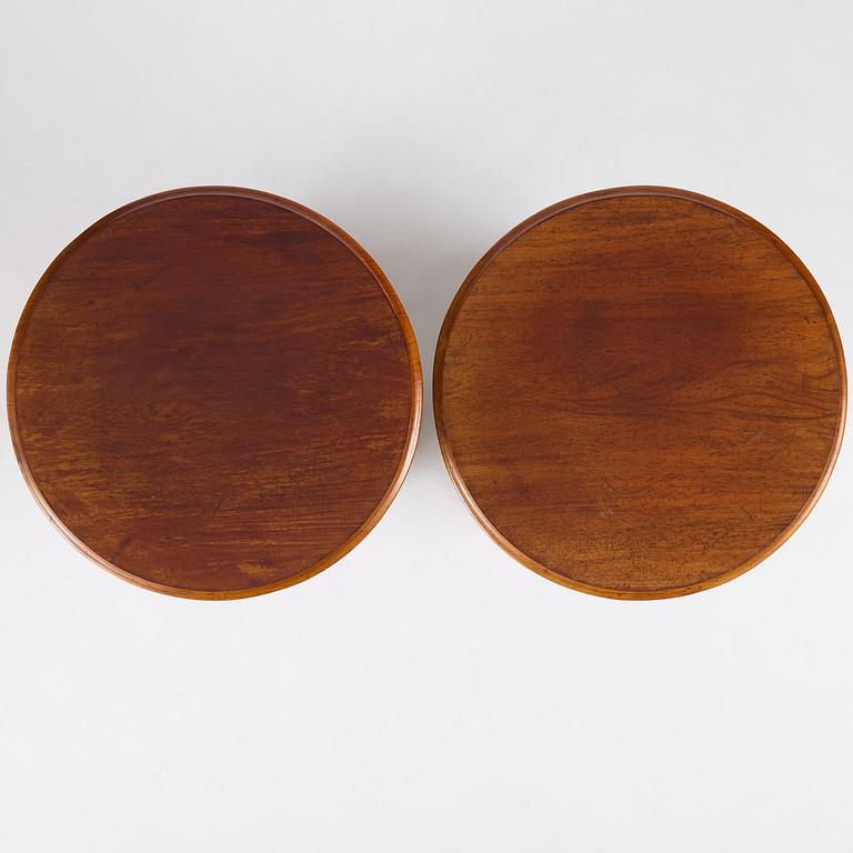 A pair of late Empire mahogany column cabinets, mid 19th Century.