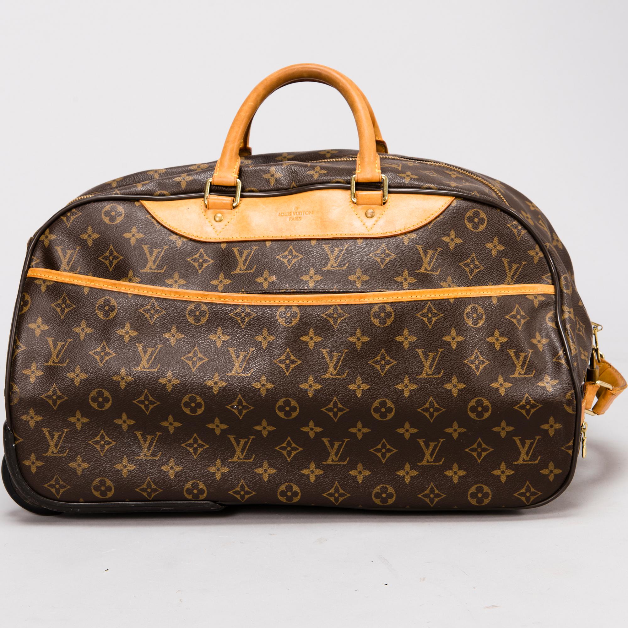 LOUIS VUITTON Monogram Canvas Eole 50 TRAVEL BAG.