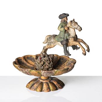 A pottered figure of a solider and horse, presumably late 17th century.