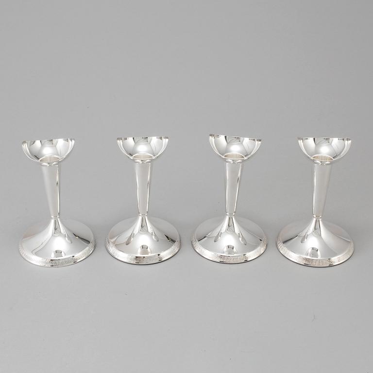 A set of four candlesticks, silver, GAB, Stockholm, 1960-1963.