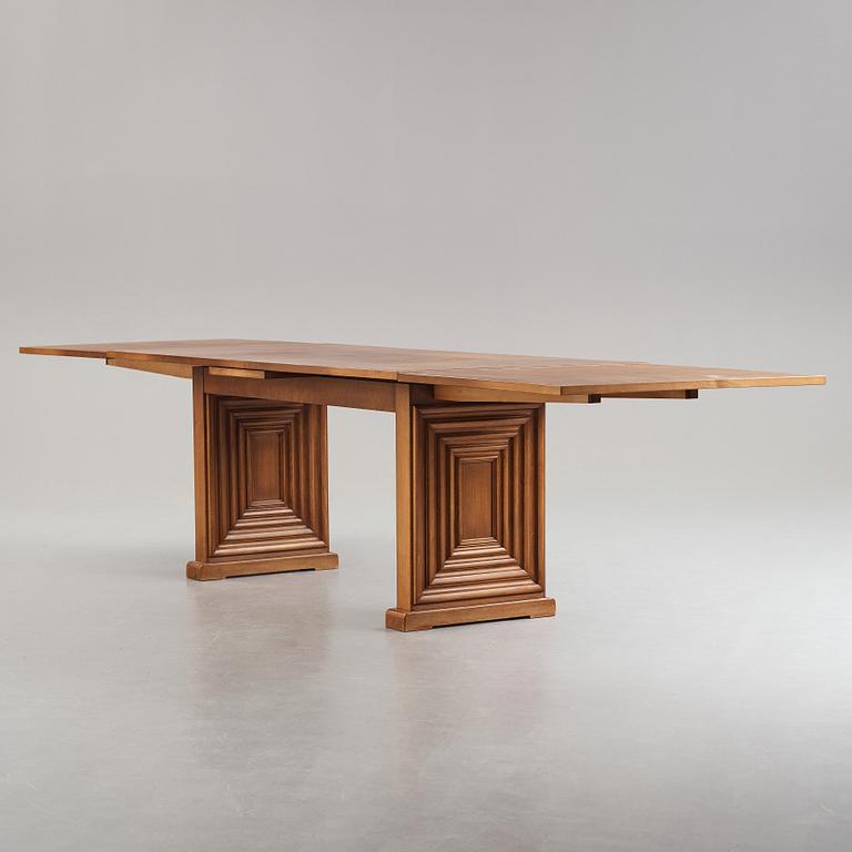 Oscar Nilsson, attributed to, a stained beech dining table, probably executed at Isidor Hörlin AB, Stockholm, 1930-40's.