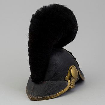 A Swedish Royal Artillery 
officer helmet and epaulets, model 1848 and model 1827-45.