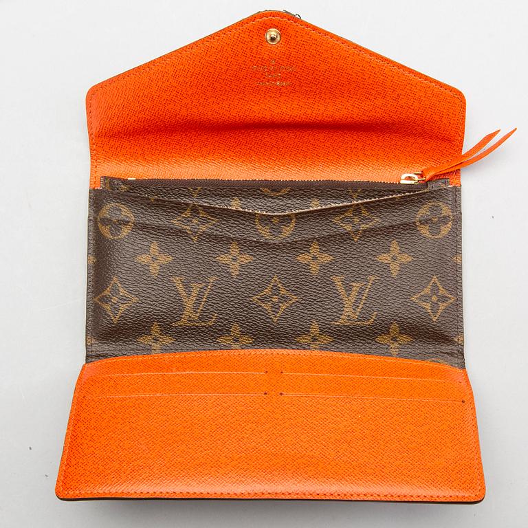 LOUIS VUITTON, pouch and a wallet.