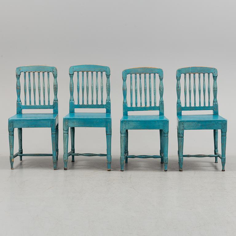 A set of four 19th century folk art chairs.