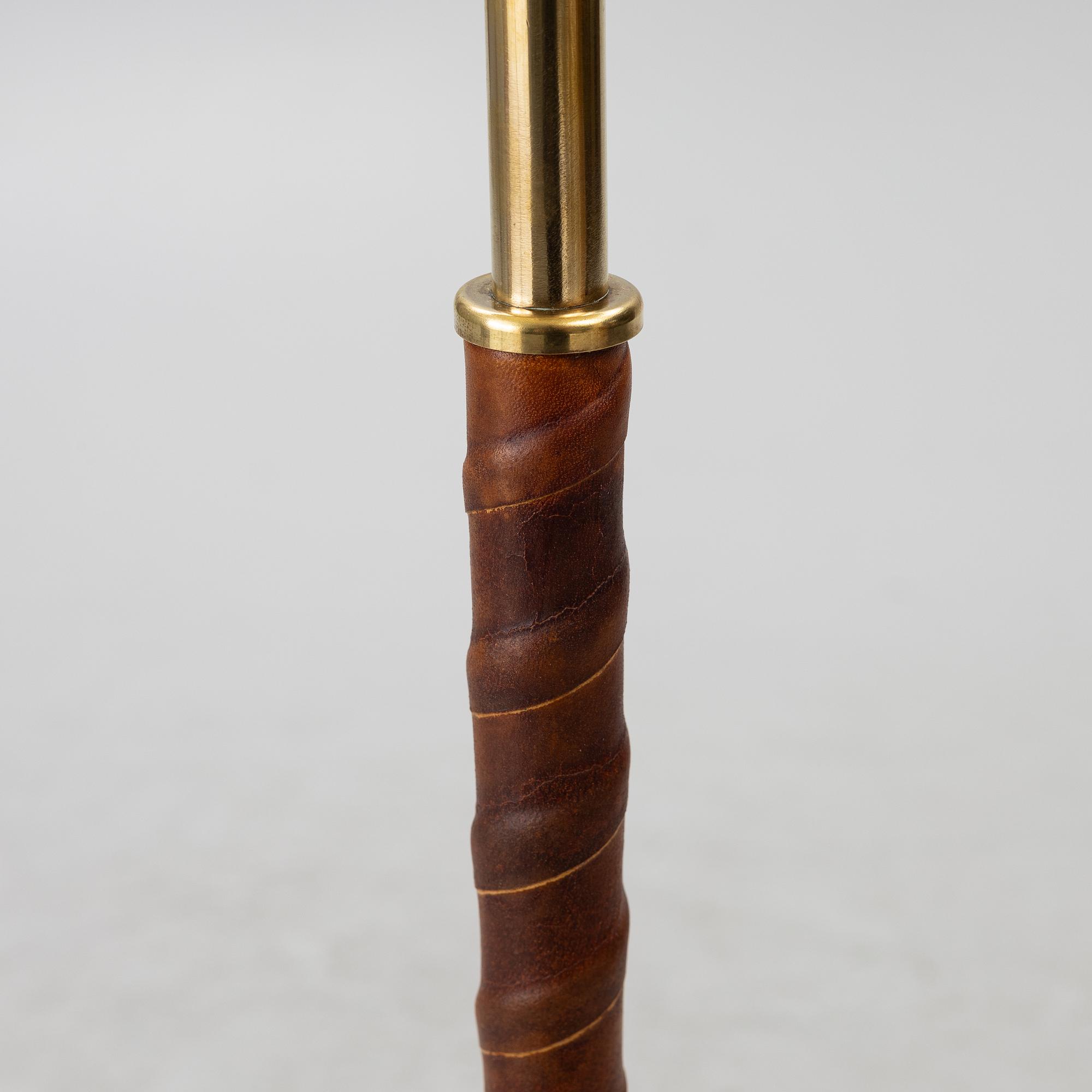Harald Notini, or Uno Westerberg, a brass floor lamp, model 15750, Arvid Böhlmarks Lamp Factory, Stockholm, 1950s.