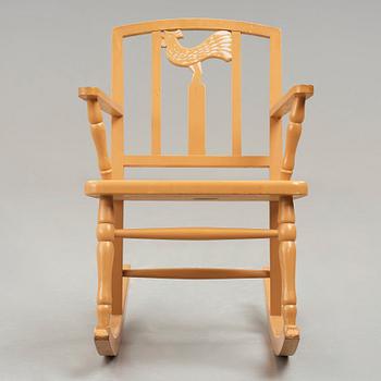 Carl Hörvik, A Carl Hörvik children's rocking chair, Nordiska Kompaniet, the model exhibited in Gothenburg 1923.