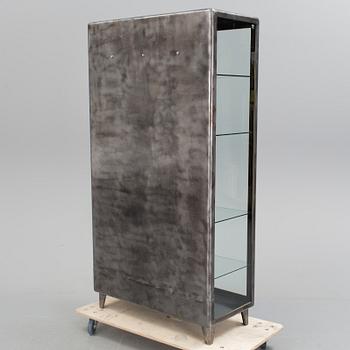 A glazed cabinet, second half of the 20th Century.