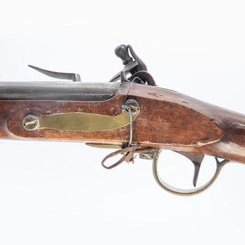 Flintlåsgevär, ändrat från slaglås.,.