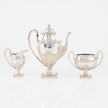 A Swedish Silver Coffee Pot, Creamer and Sugar Bowl, mark of Ludvig Axelson Jr, Stockholm 1899.