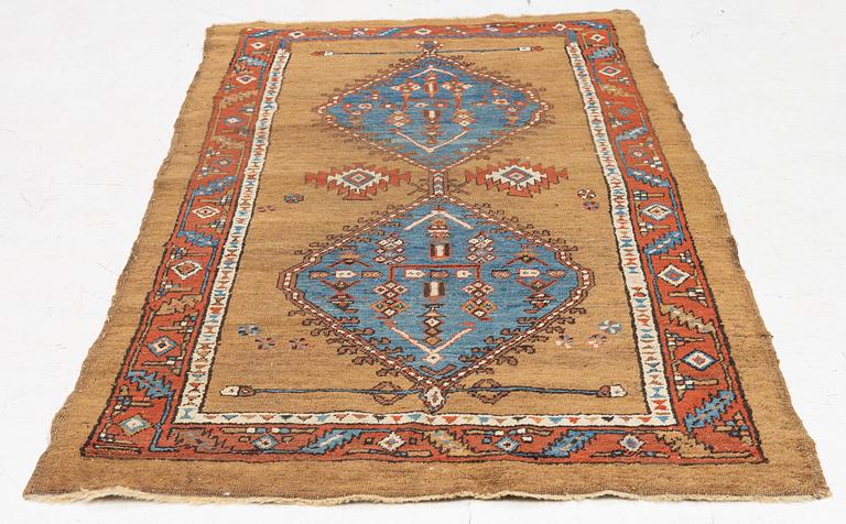 An antique Sarab rug, northwestern Iran, c. 213 x 107 cm.